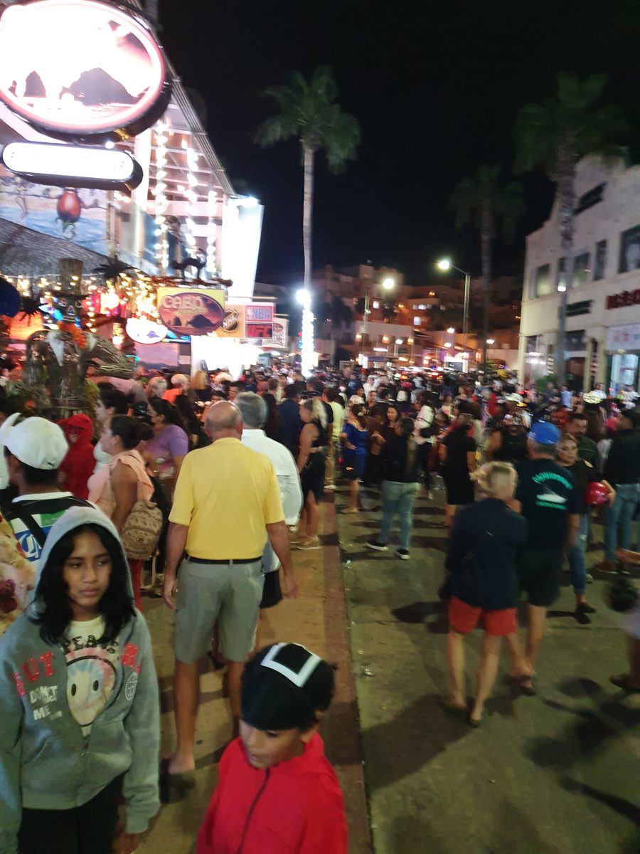 Costumed children and families gathered outside Cabo Cantina on Halloween night.